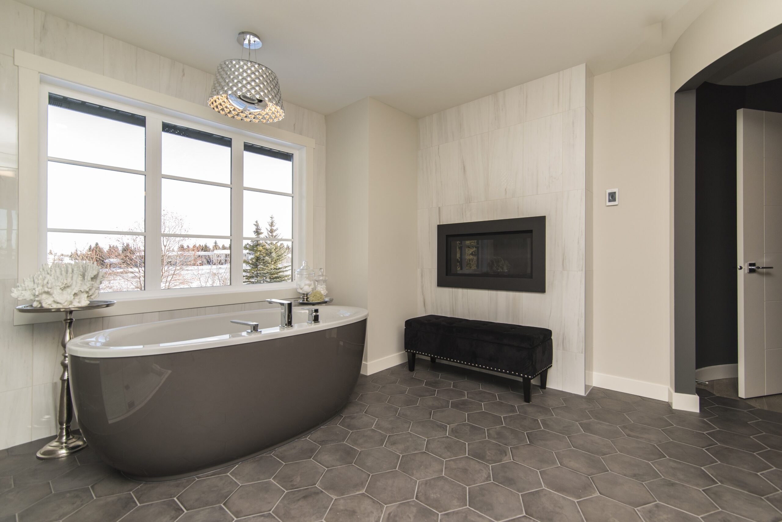 beautiful shot of a modern house bathroom with technology and art